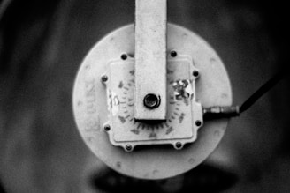 Monochrome technical diagram of interconnected gears symbolizing AI workflow automation.