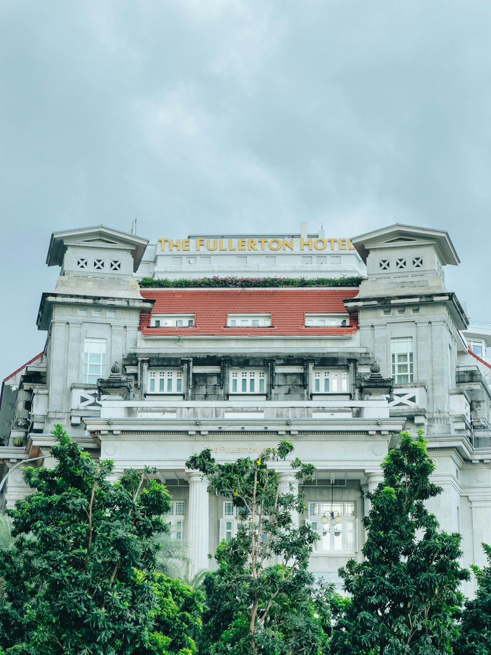 a large building with a sign on top of it