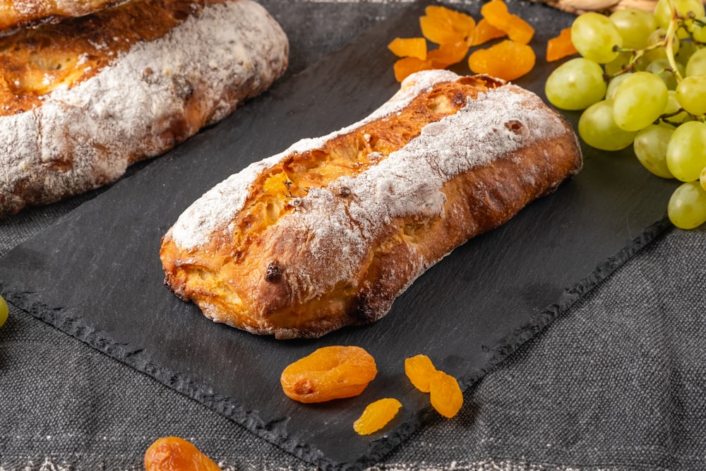 a couple of breads sitting on top of a table