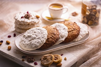 Delicious cookies arranged on a rustic wooden table.