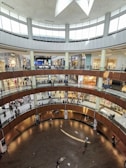 an overhead view of a shopping mall with people walking around