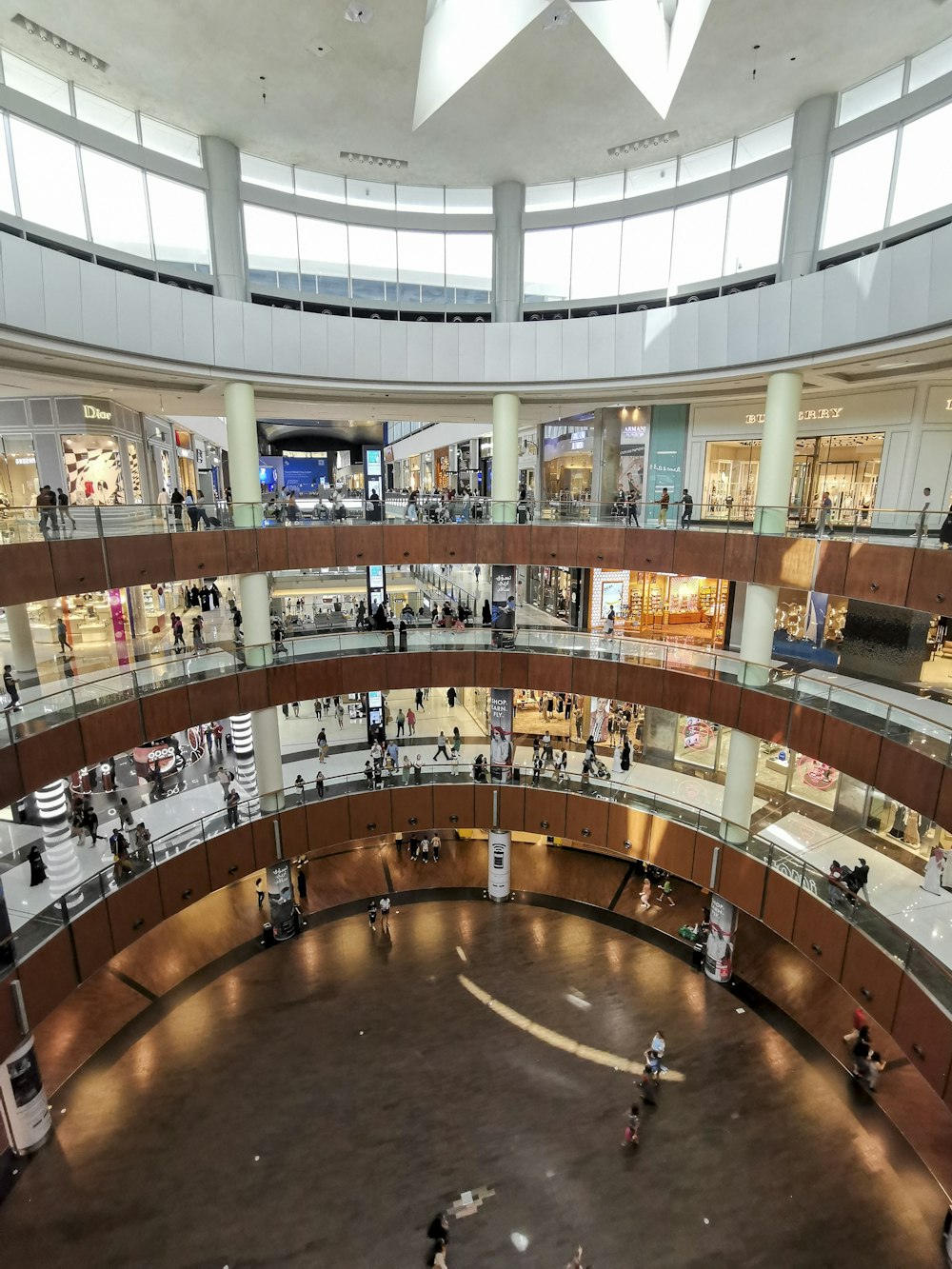 an overhead view of a shopping mall with people walking around