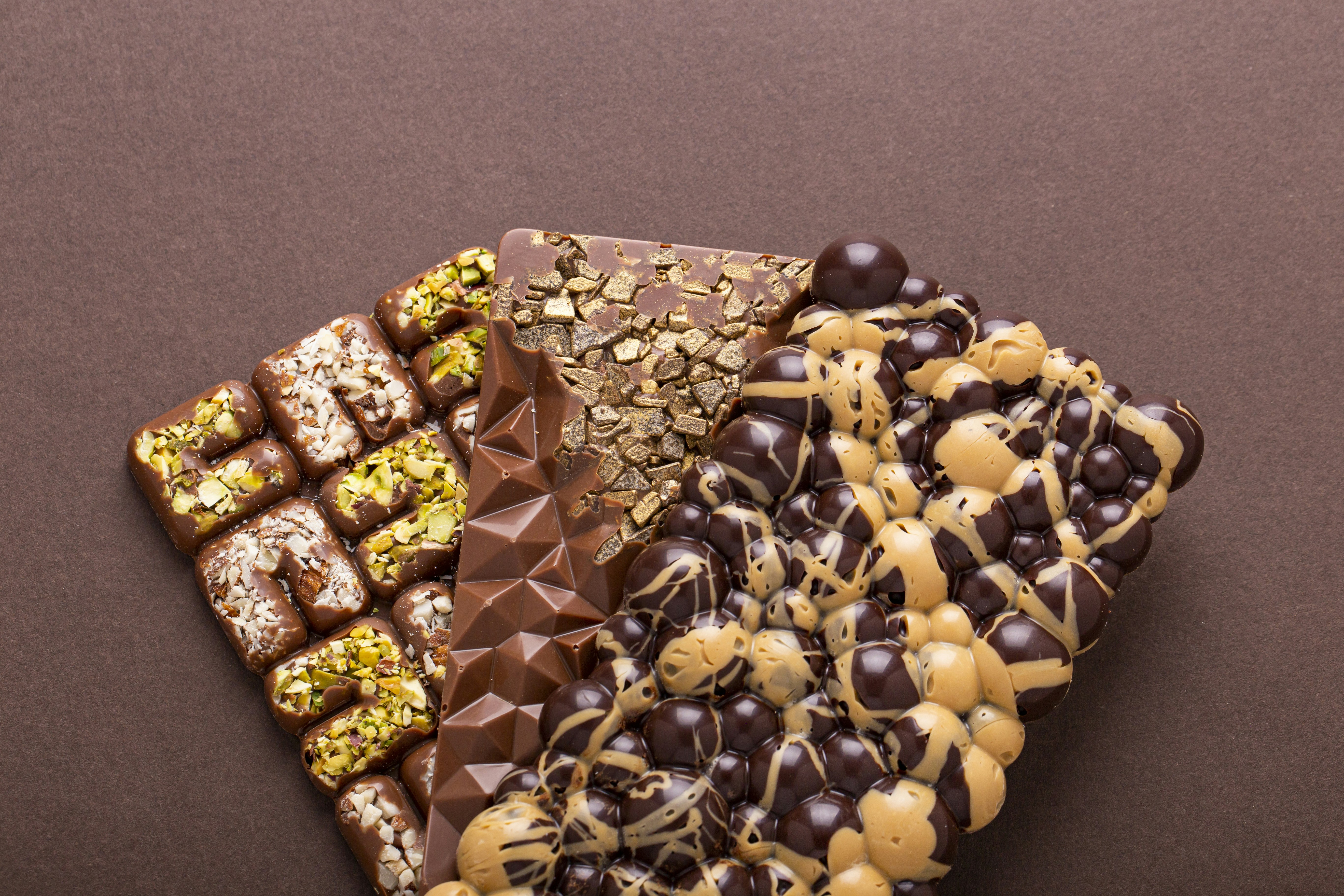 a table topped with lots of different types of desserts