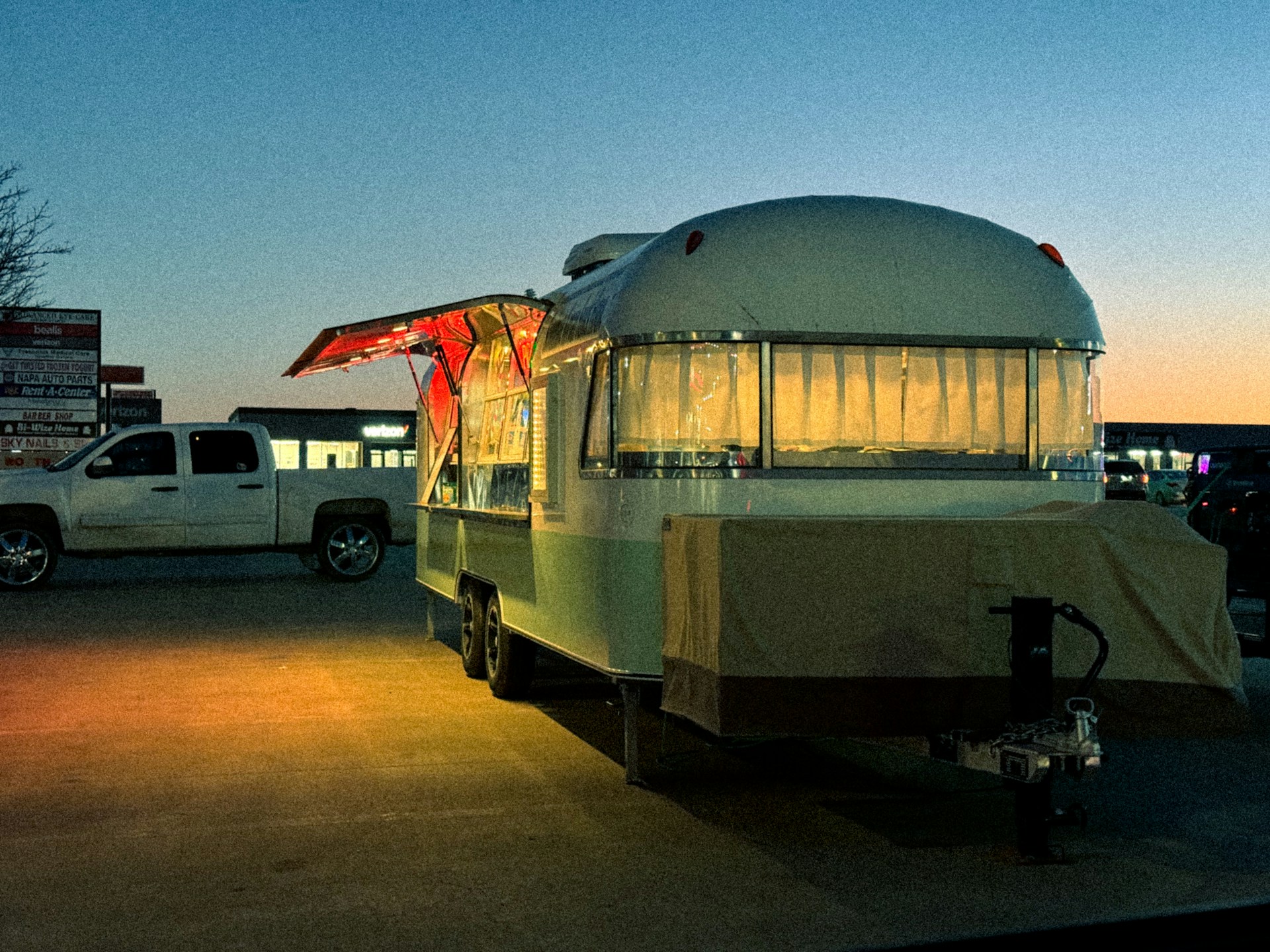 woman wearing yellow long-sleeved dress under white clouds and blue sky during daytime