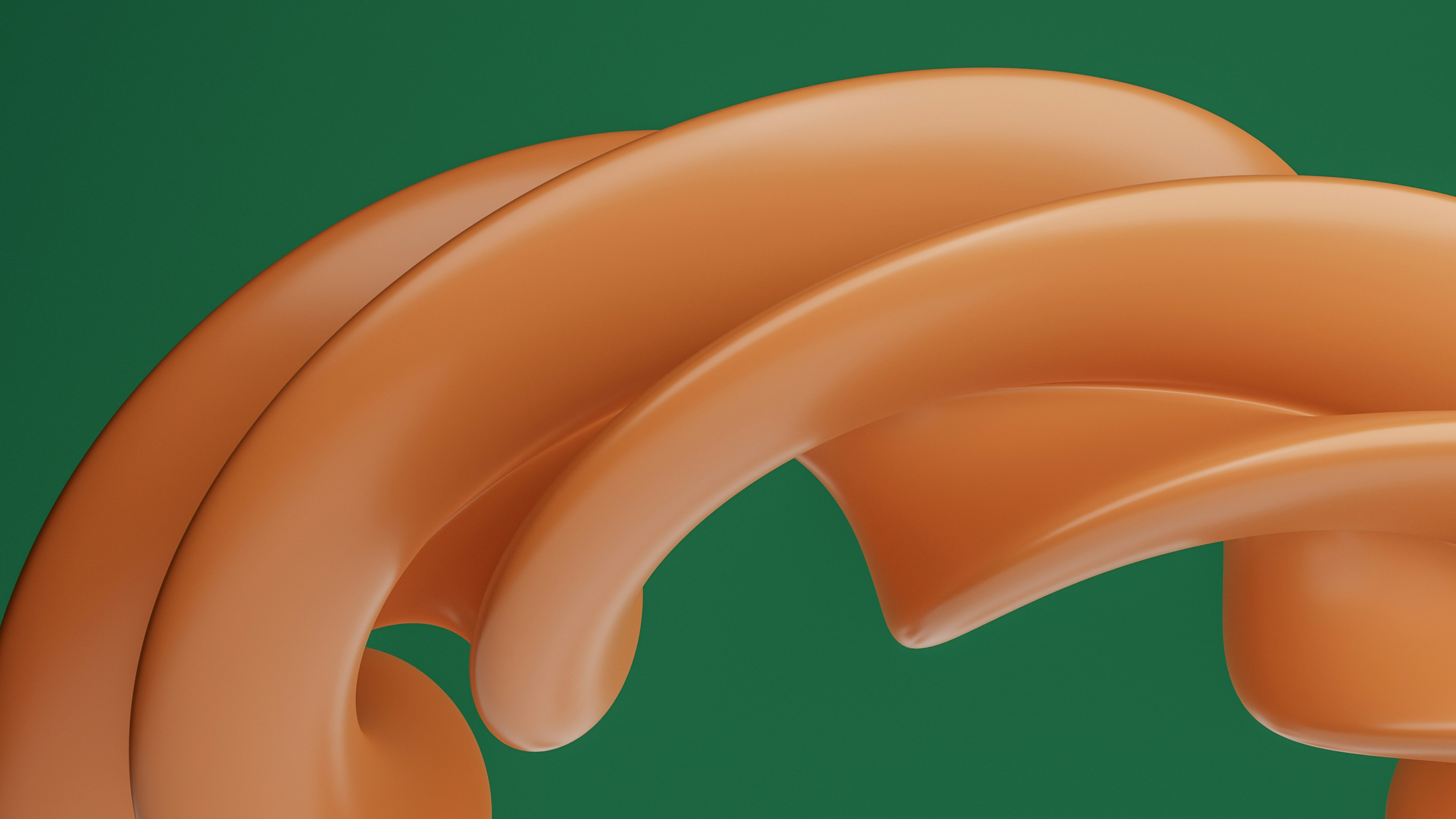 a green background with an orange object in the middle