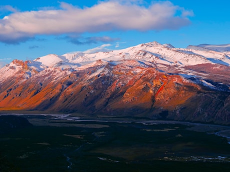 A stunning 4K video still of a vibrant sunset over the Andes mountains near San Miguel de Tucumán.