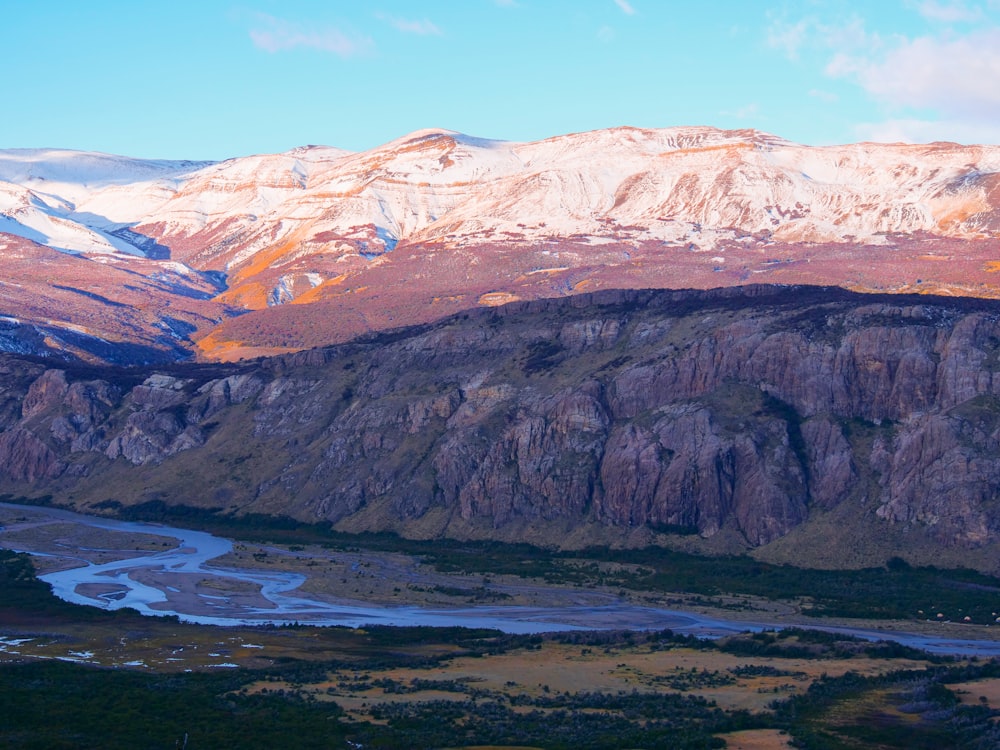 a mountain range with a river running through it