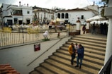 Families enjoying the festivities in the town square.