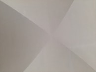 An abstract composition of geometric shapes in warm slate and pearl white, evoking intentional design.