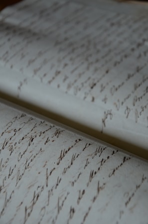 a close up of a very old writing paper