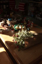 A cozy craft table with colorful supplies and a welcoming handwritten note.