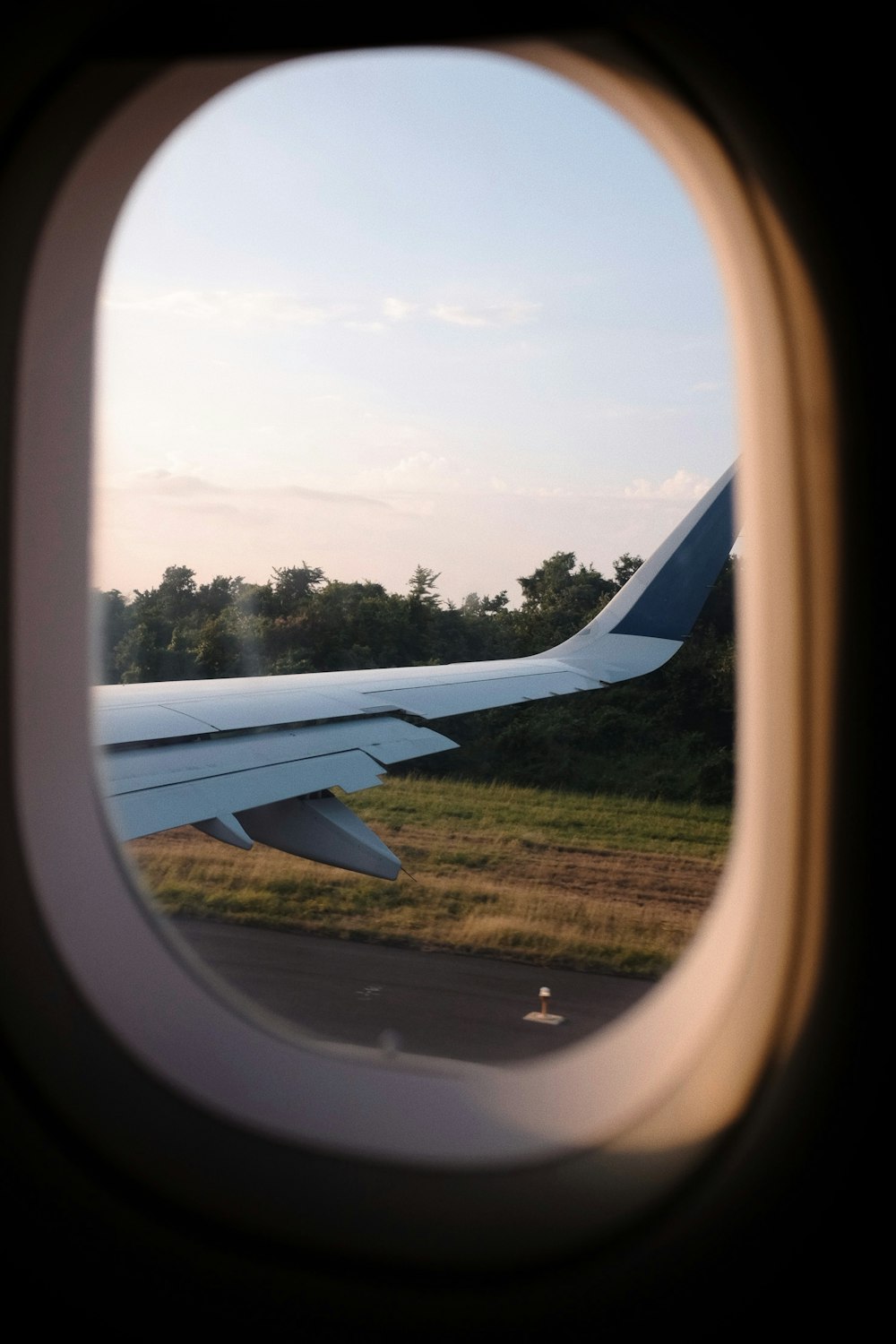 a view of the wing of an airplane from a window