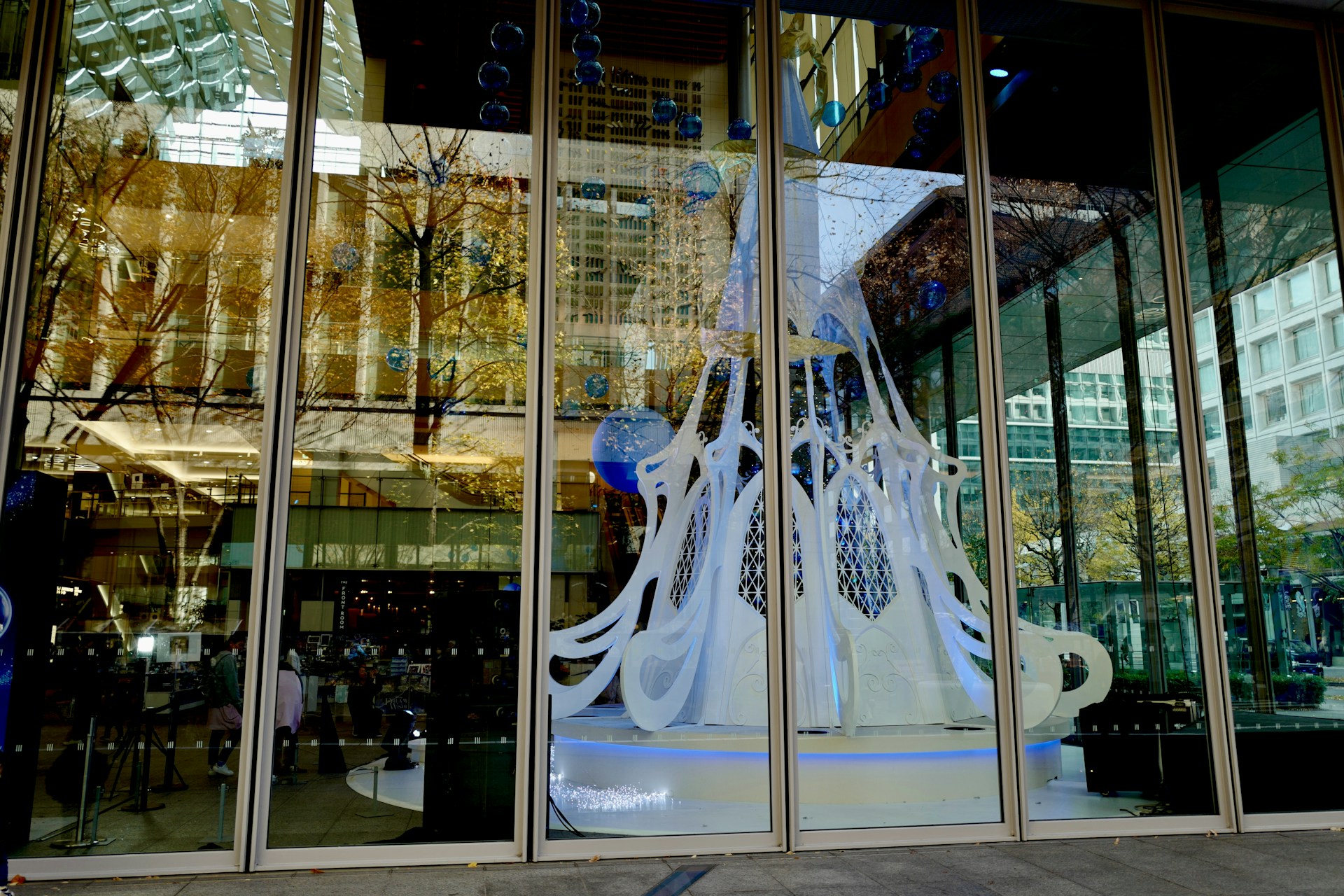 woman wearing yellow long-sleeved dress under white clouds and blue sky during daytime