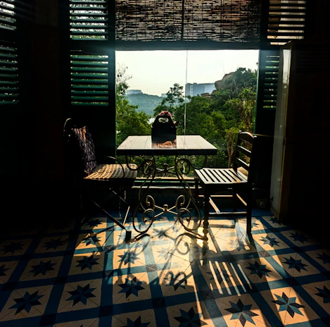 Outdoor seating area bathed in morning sunlight, perfect for relaxing