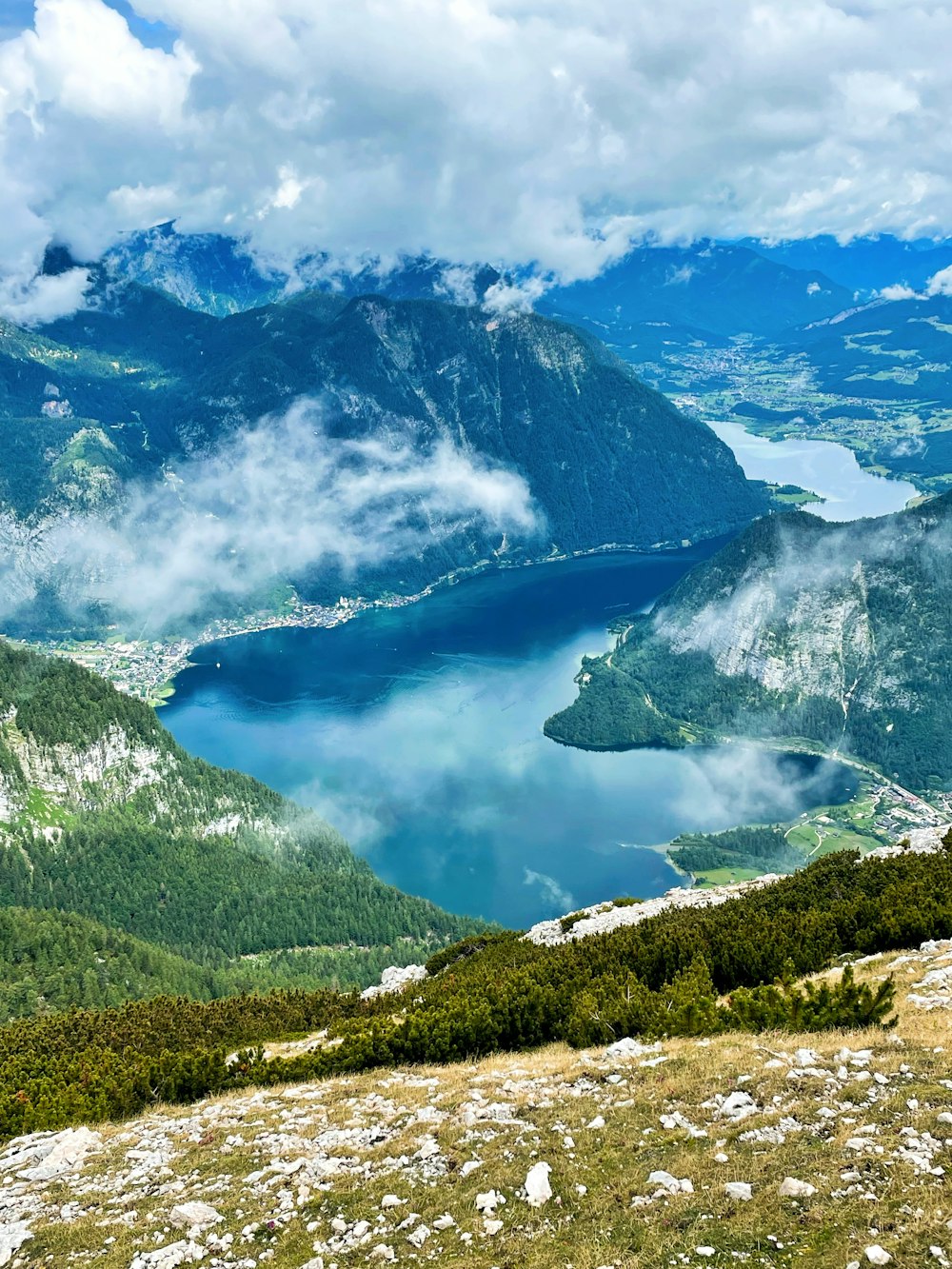 a view of a lake from a mountain top