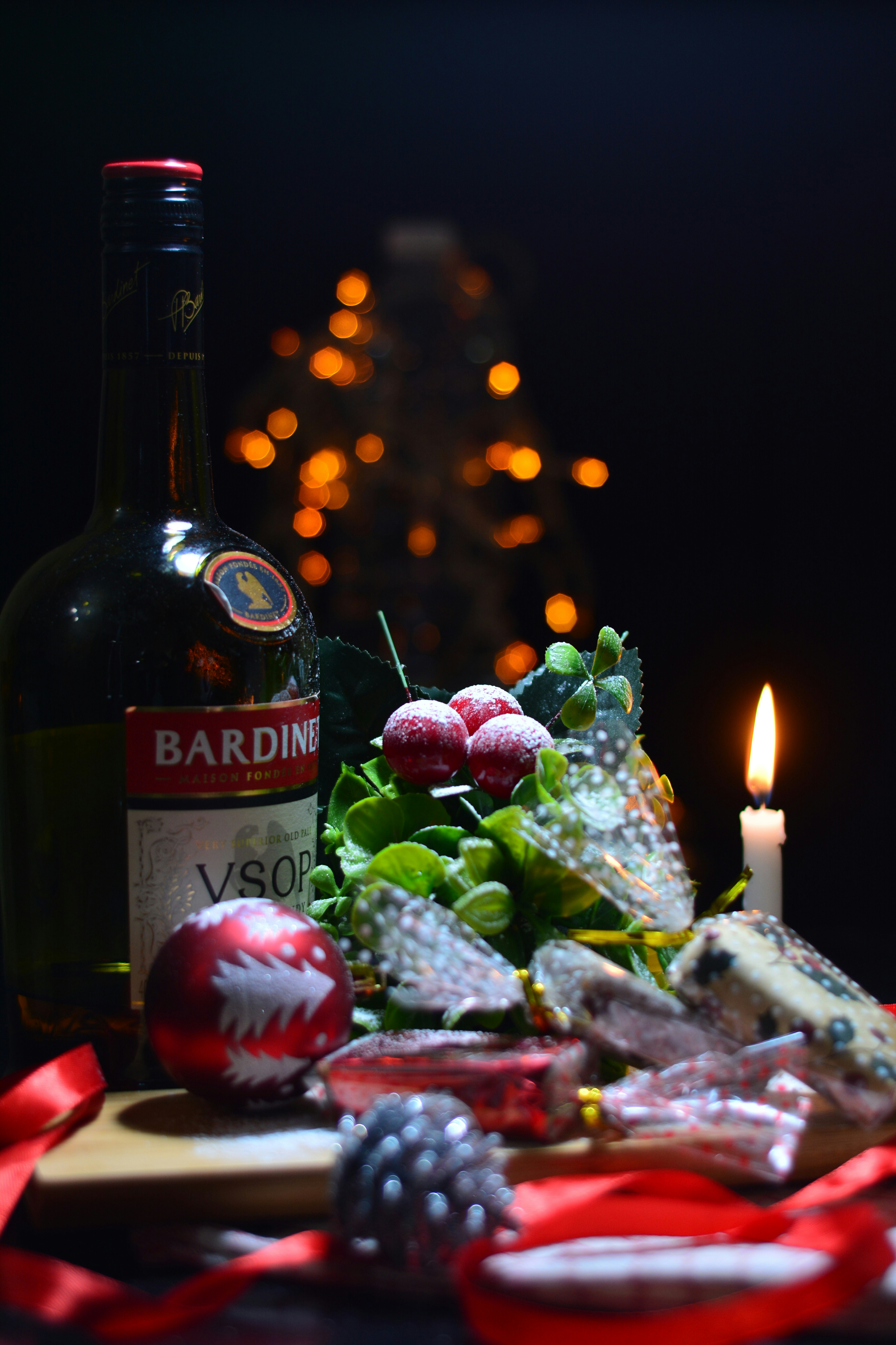 a bottle of wine and some food on a table