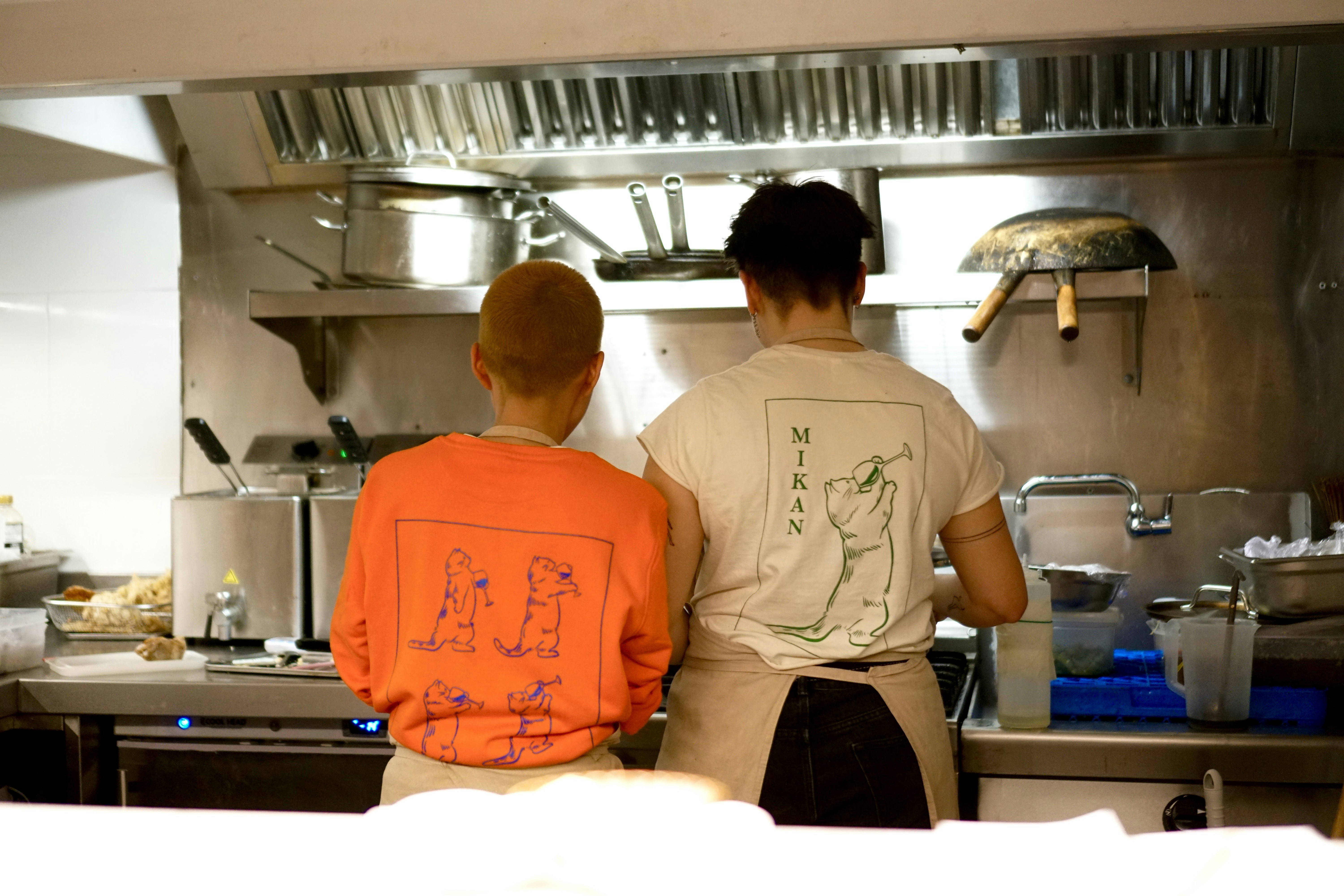 Couple cooking together in kitchen