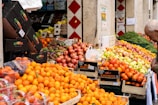 Stacked crates of vibrant fruits ready for export at the Johannesburg fresh produce market.