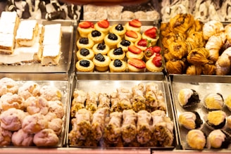 a display case filled with lots of different types of pastries