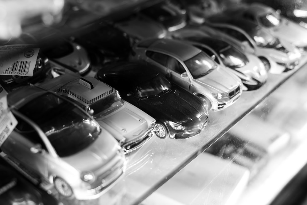 a display case filled with lots of toy cars