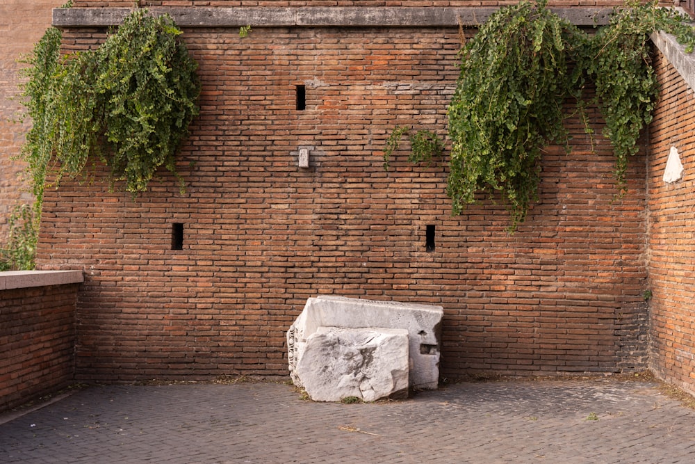 a brick wall with ivy growing on it