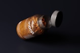 a close up of a jar of food on a table