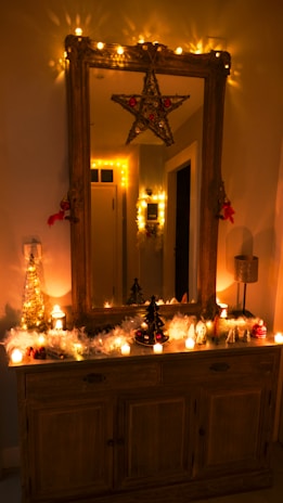 A decorative mirror with animated LED lights creating a warm, inviting ambiance in a living space.