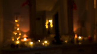 A softly blurred background image of a cozy family living room with warm lighting.