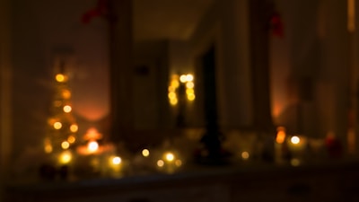 A softly blurred background image of a cozy family living room with warm lighting.