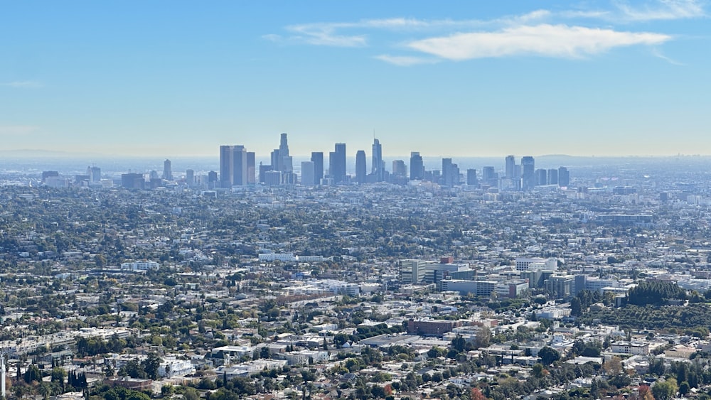 a view of a city from the top of a hill