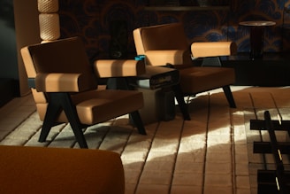 Finished interior setup with elegant furniture in warm brown and black tones.