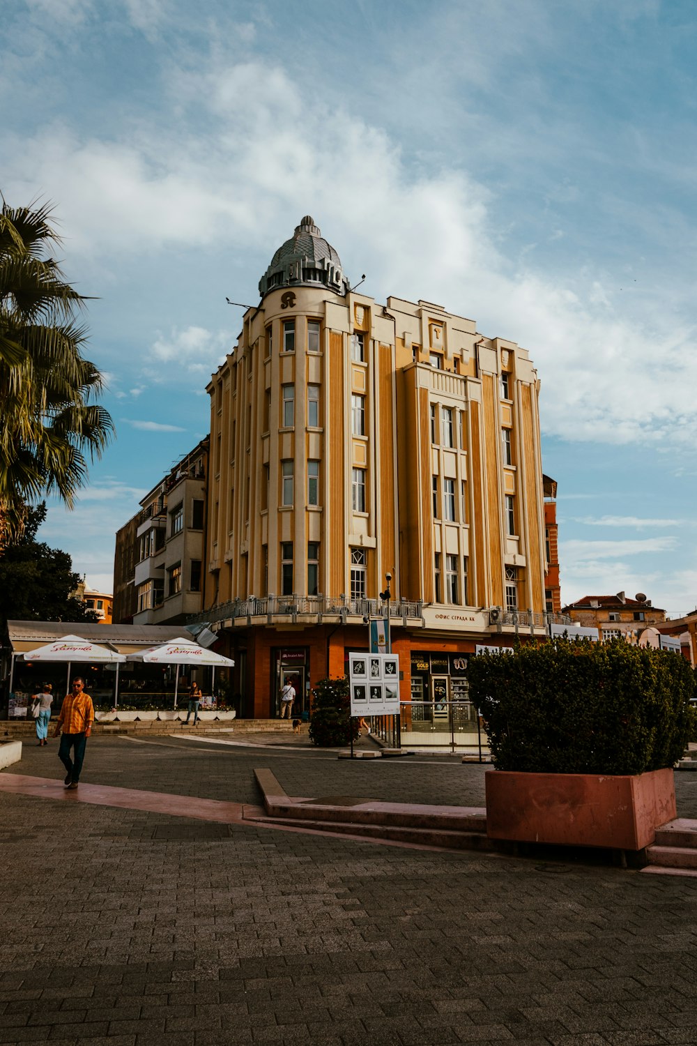 a tall building with a clock on the top of it