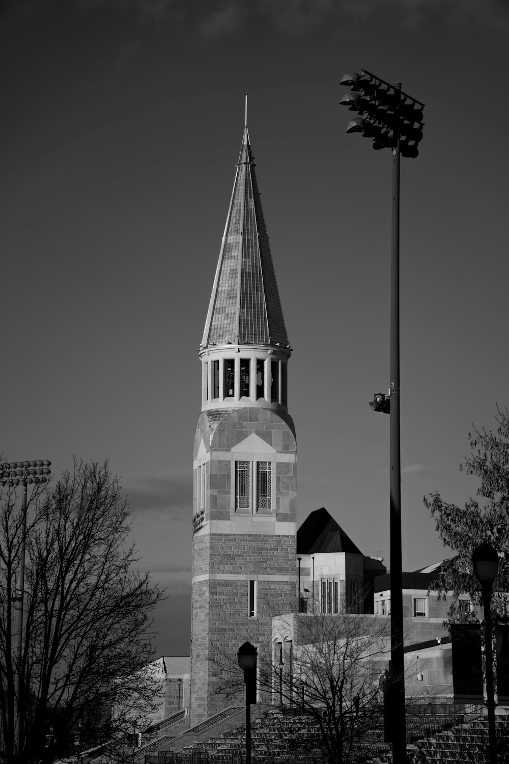 a black and white photo of a clock tower