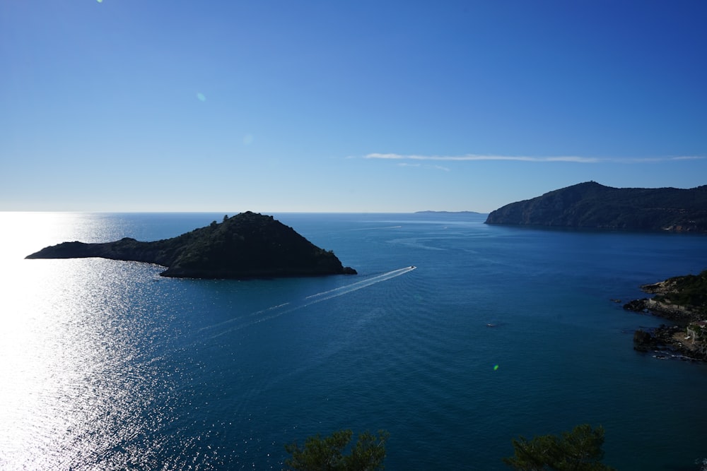 a small island in the middle of a large body of water