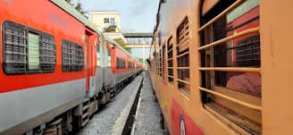 a couple of trains parked next to each other