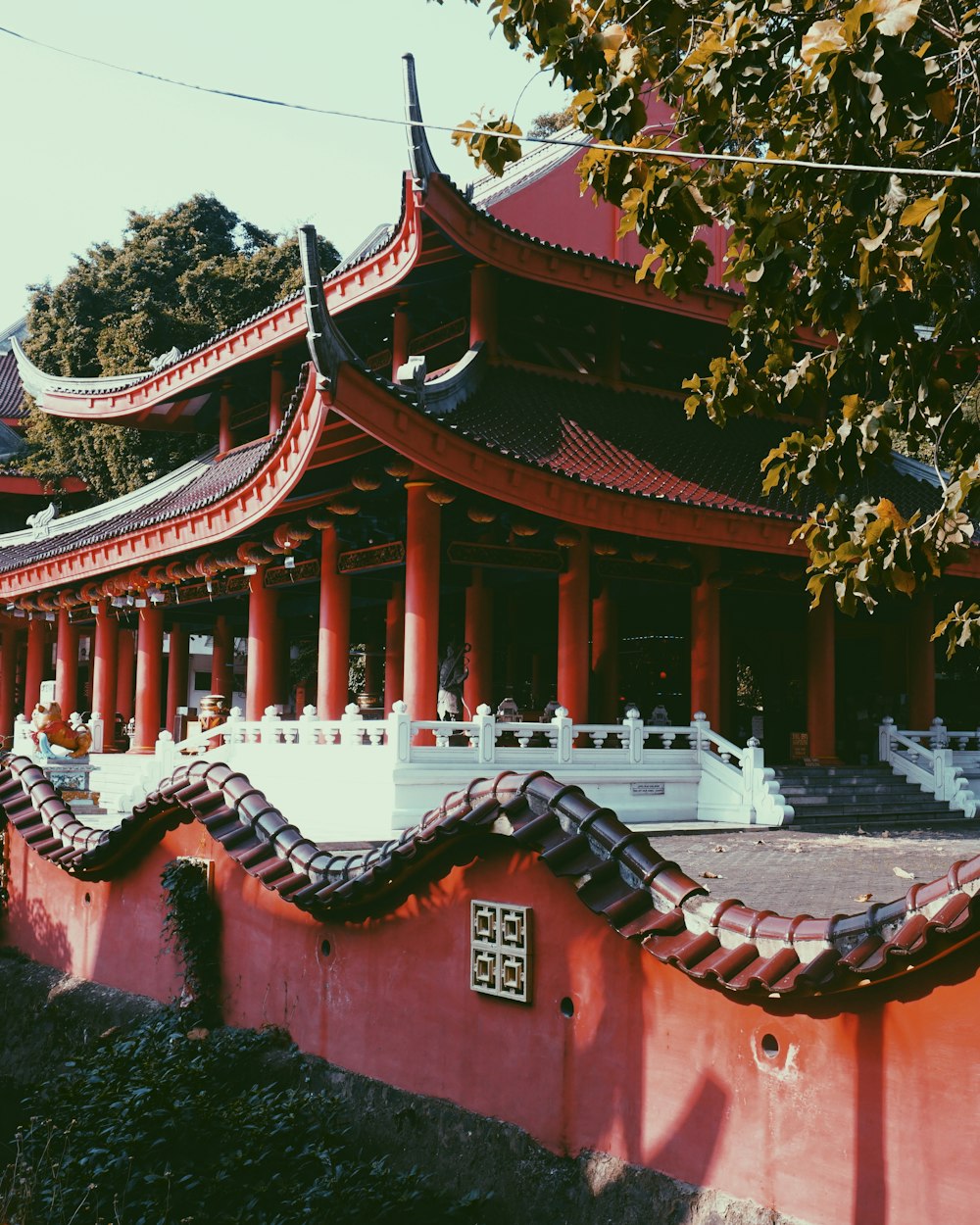 a large red building with a red roof