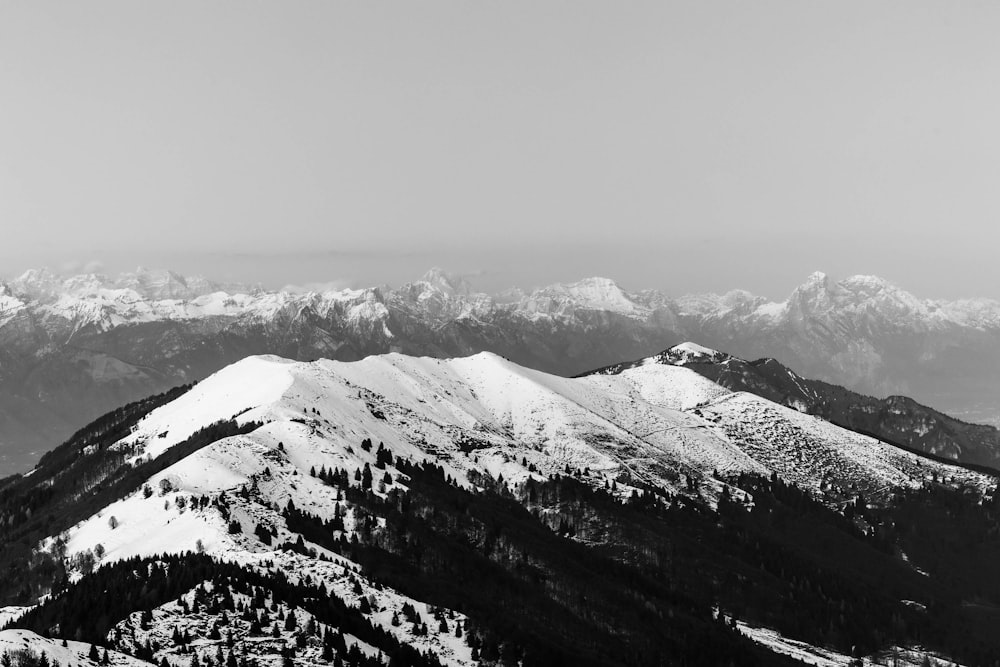 a black and white photo of a mountain range