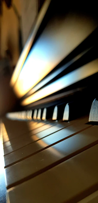 a close up of a row of wooden benches