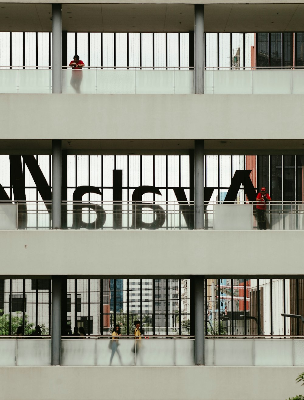 a tall building with a sign on the side of it