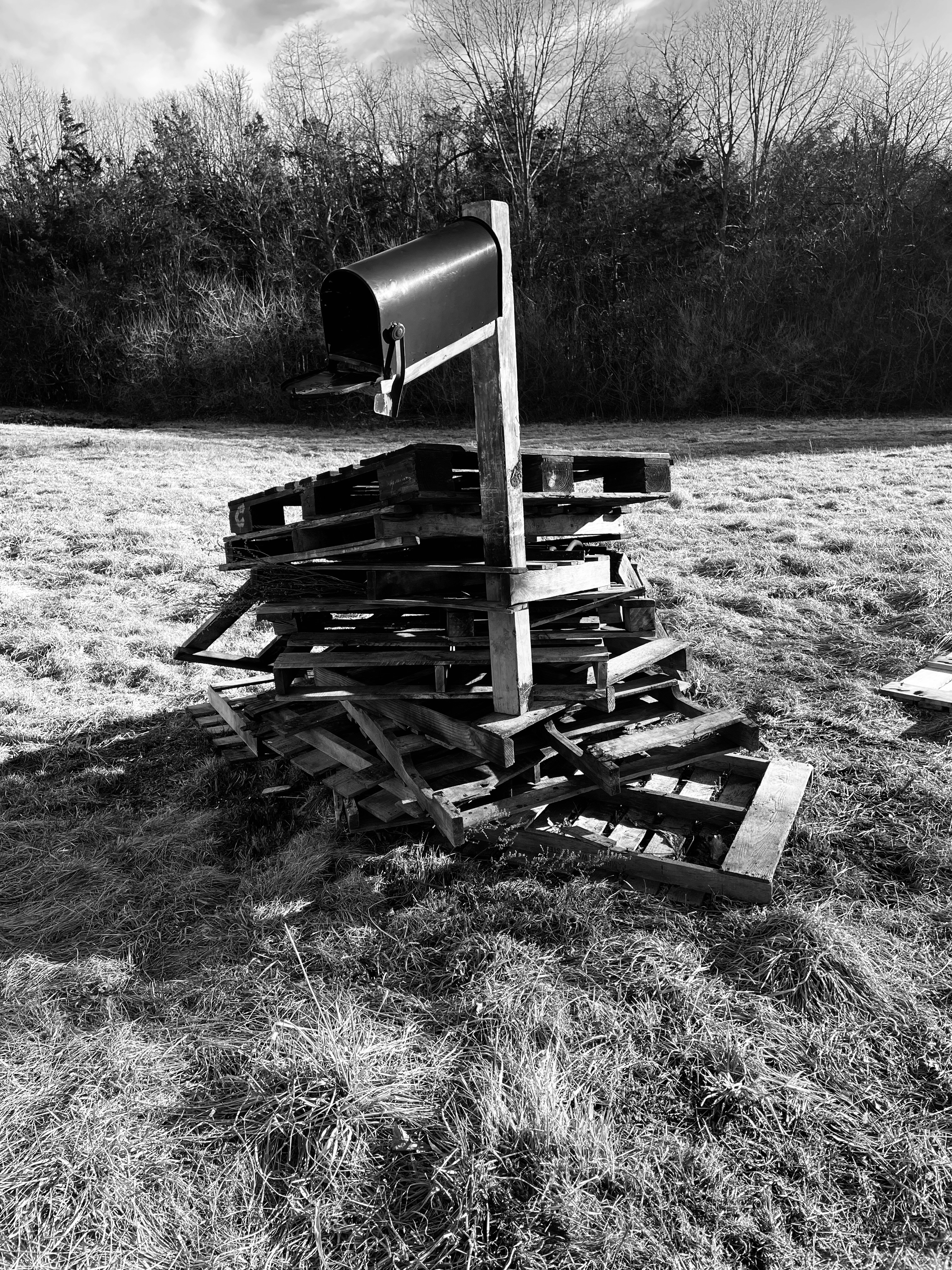A before-and-after split image showing a damaged mailbox and the freshly repaired version.