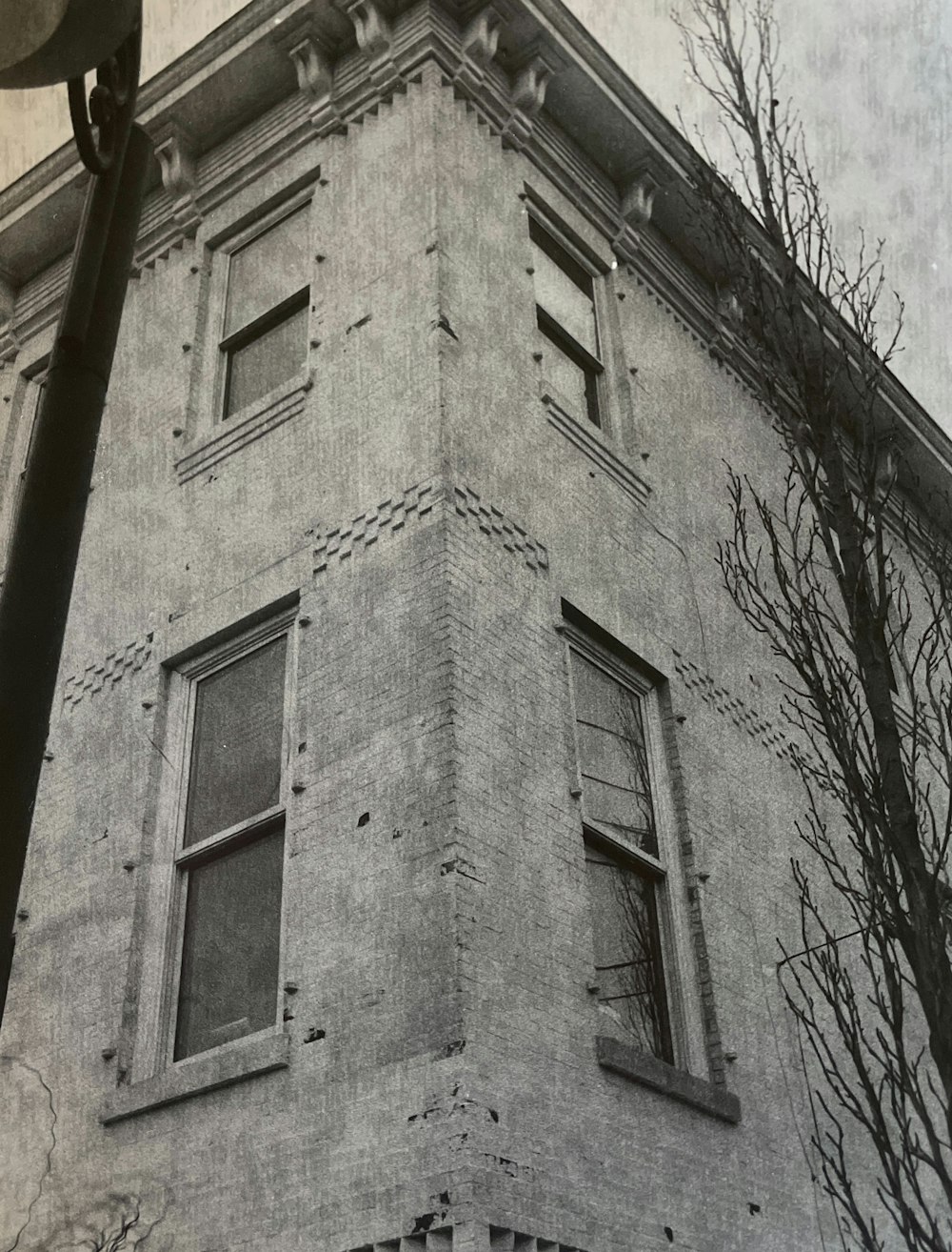 a black and white photo of a tall building