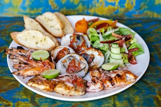 a white plate topped with lots of different types of food