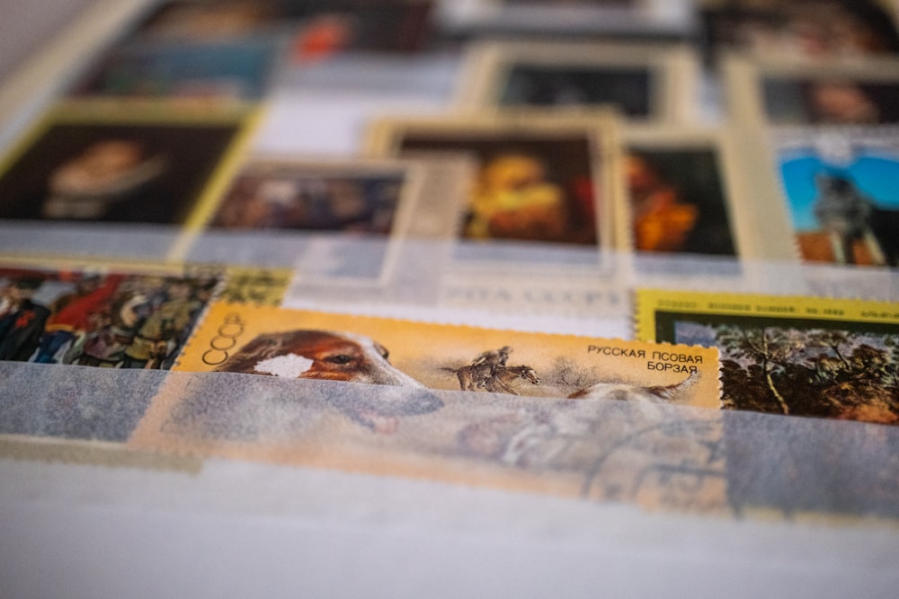 a bunch of stamps that are on a table