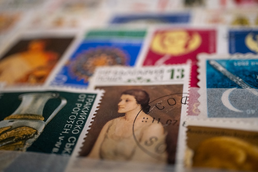 a close up of a bunch of stamps on a table