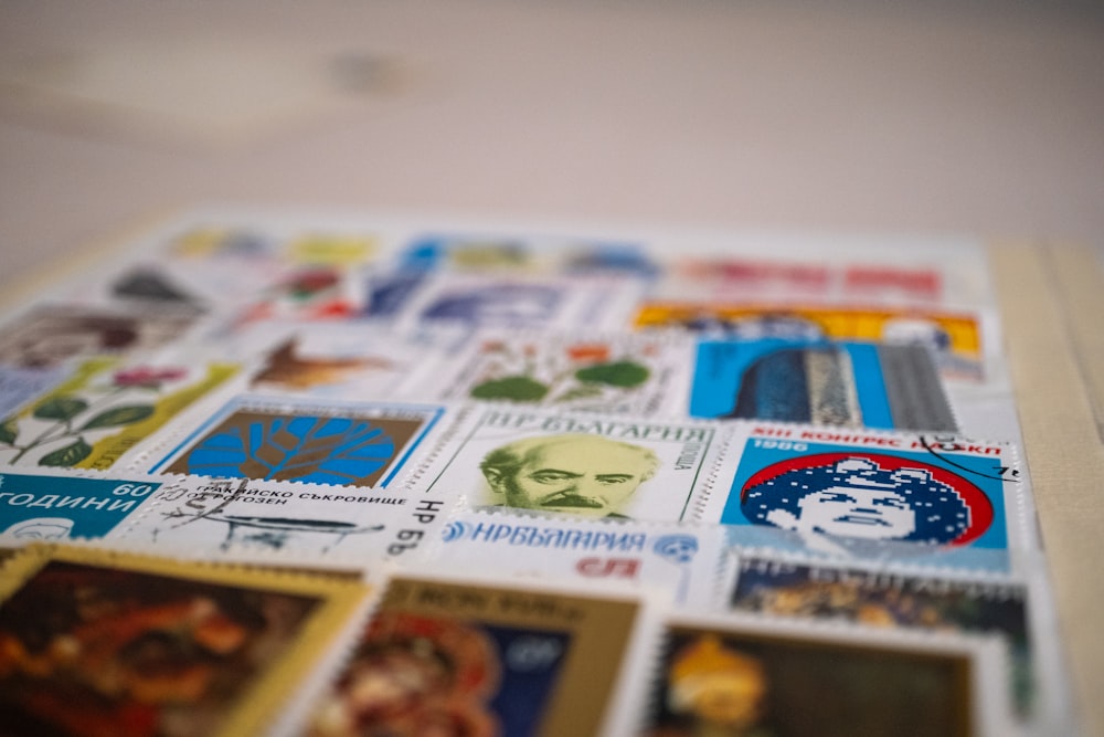 a close up of a bunch of stamps on a table