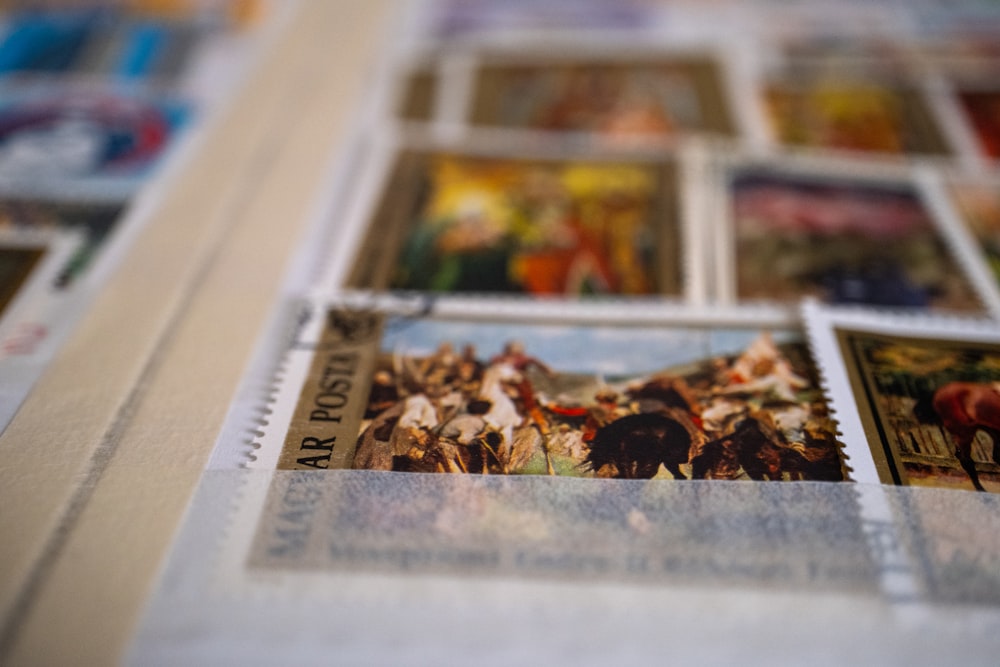 a bunch of stamps that are on a table