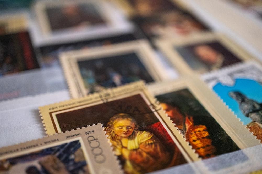 a close up of a bunch of stamps on a table