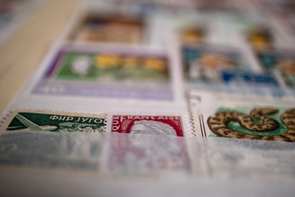 a close up of a number of stamps on a table