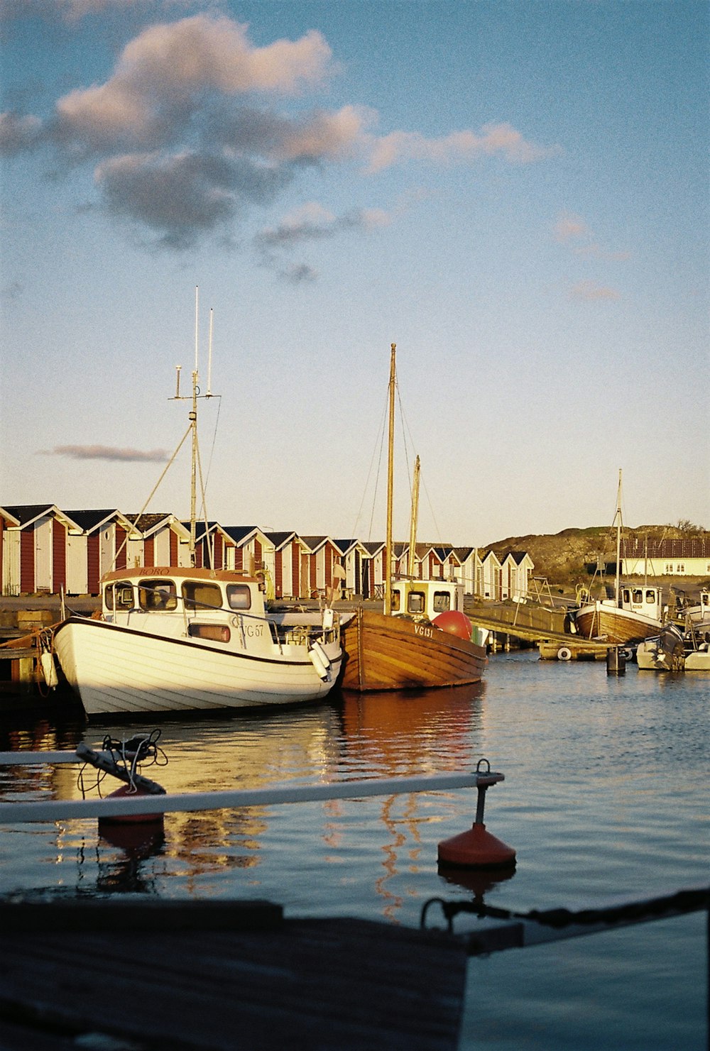 a couple of boats that are sitting in the water