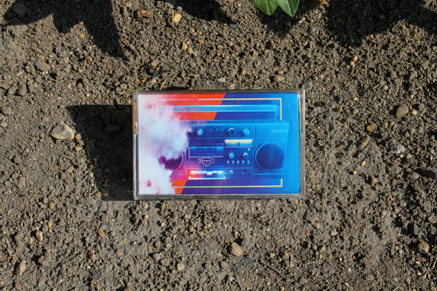 A vibrant mix tape artwork blending cassette tapes and urban graffiti with dynamic 3D cursor effects.